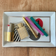 Jonathan Adler tray from Higher Standards; lighters by Tetra and Tsubota Pearl.